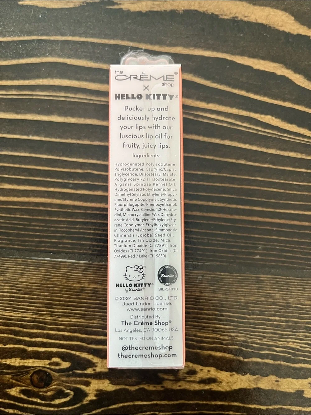Hello Kitty Peach Tinted Lip Oil - Coral Pink Packaging